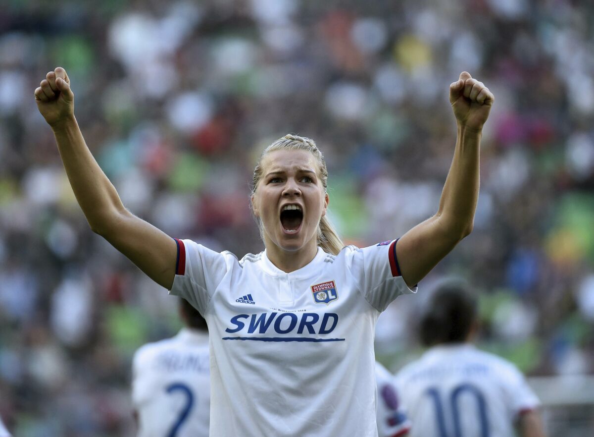 FILE - Ada Hegerberg of Lyon celebrates her goal during the women's soccer UEFA Champions League final match between Olympique Lyon and FC Barcelona at the Groupama Arena in Budapest, Hungary, on May 18, 2019. Ada Hegerberg’s comeback season has her and her Lyon teammates back in yet another Women’s Champions League final. The seven-time champions will face defending titlist Barcelona in Turin on Saturday in a repeat of the 2019 final. (Balazs Czagany/MTI via AP)