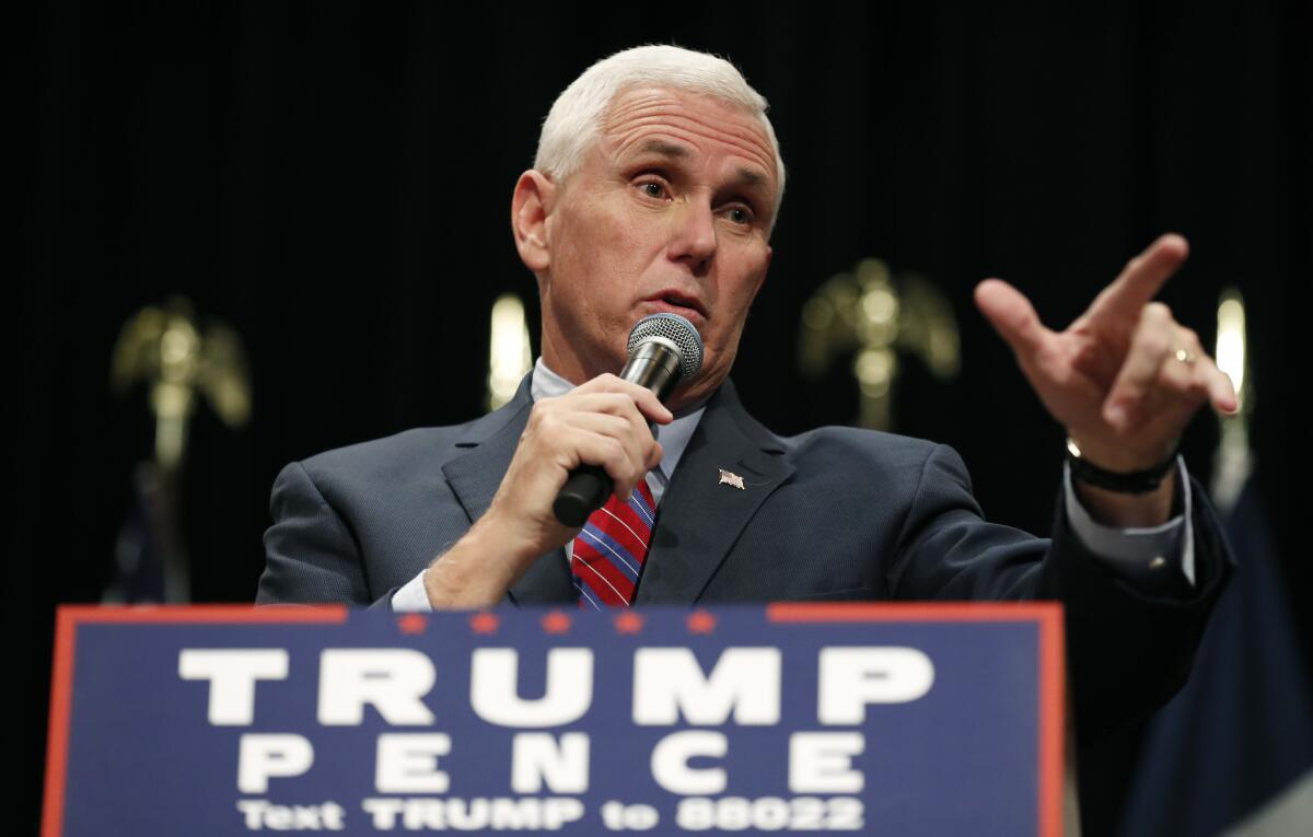 Republican vice presidential candidate Indiana Gov. Mike Pence speaks during a campaign rally, Tuesday, Oct. 11, 2016, in Newton, Iowa.