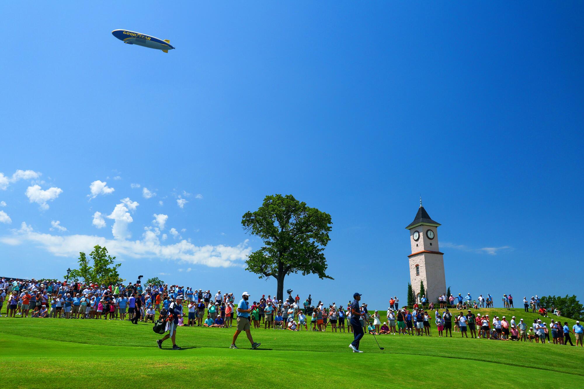 Tiger Woods walks from the fifth tee during the first round of the 2022 PGA Championship at Southern Hills Country Club.