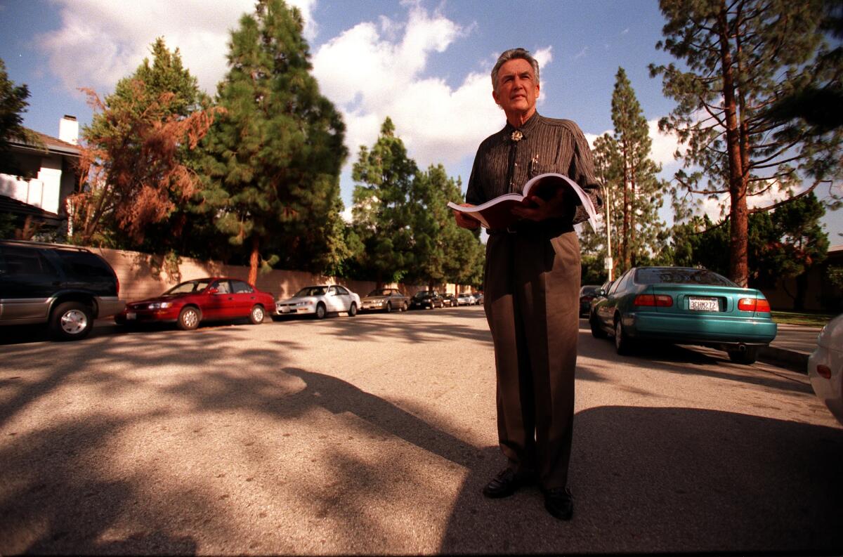 Dion Neutra, son of Richard Neutra, visits a Northridge street in 1999. One of his father's homes once stood nearby.