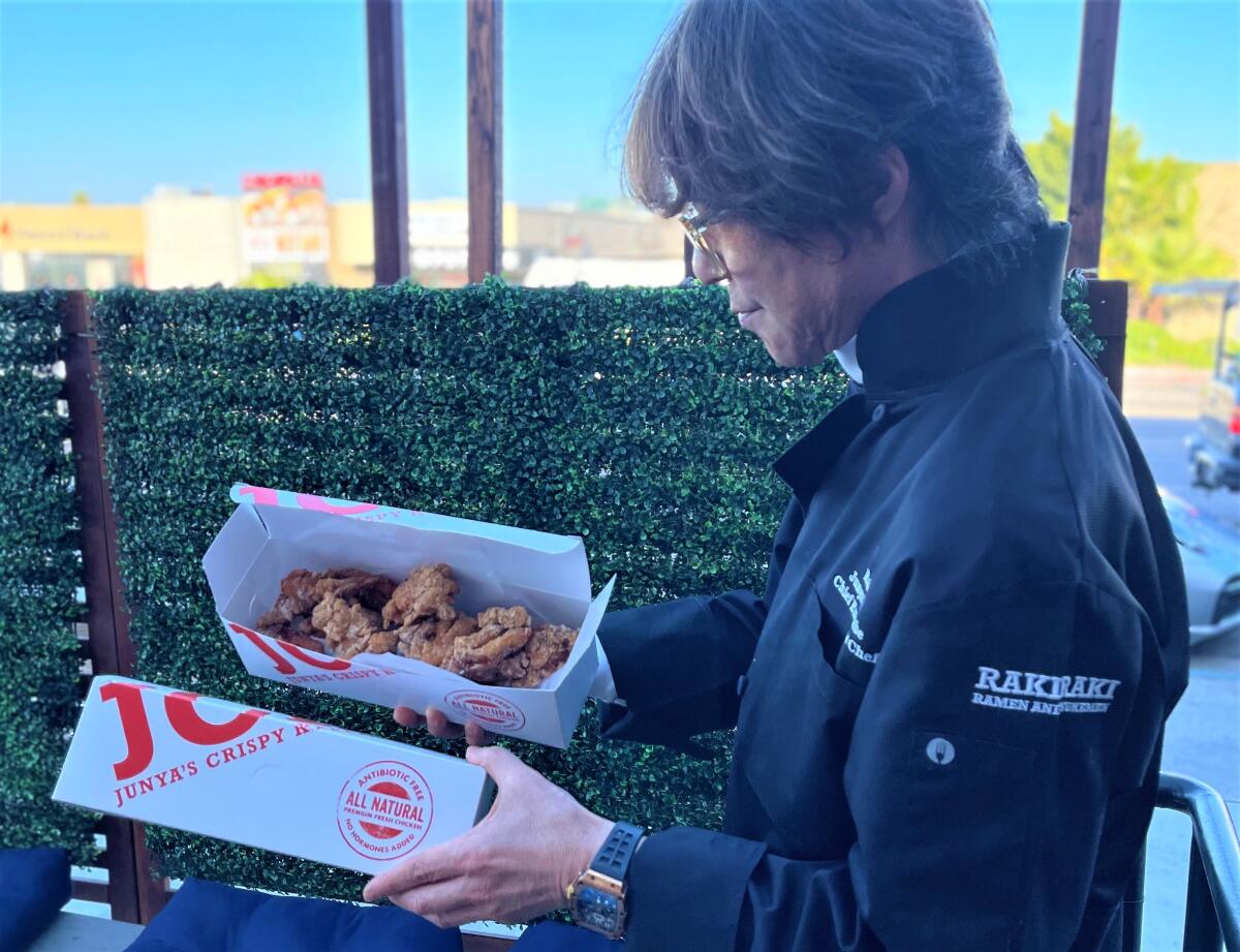 Junya Watanabe with his karaage chicken at RakiRaki Ramen on Convoy Street in San Diego.