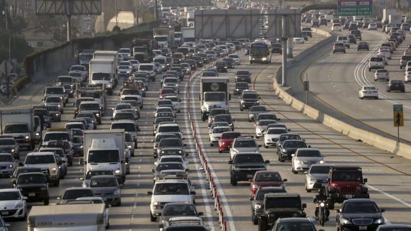 Traffic on the 110 Freeway. An initiative on the Nov. 6 ballot would repeal increased gas taxes and a vehicle fee aimed at repairing California roads and bridges.