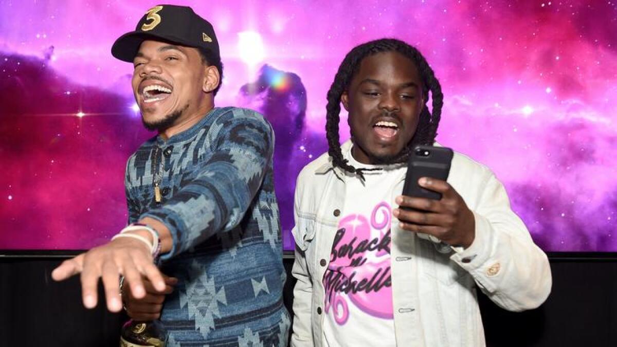 Chance the Rapper and DJ Oreo celebrate at the Chateau Marmont on Feb. 12, 2017.