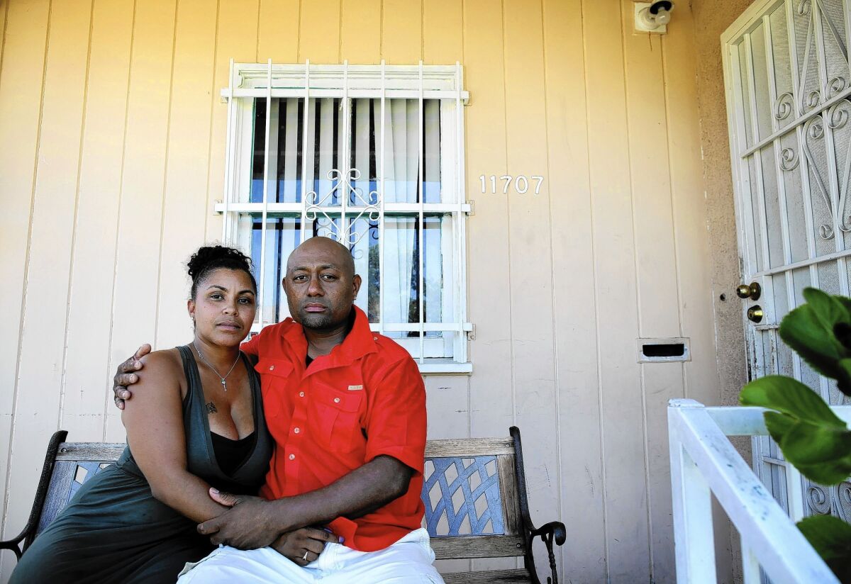 Tyesha Hansborough, left, and Christley Paton have battled for months to resolve an insurance policy lapse that they blame on their mortgage servicer.