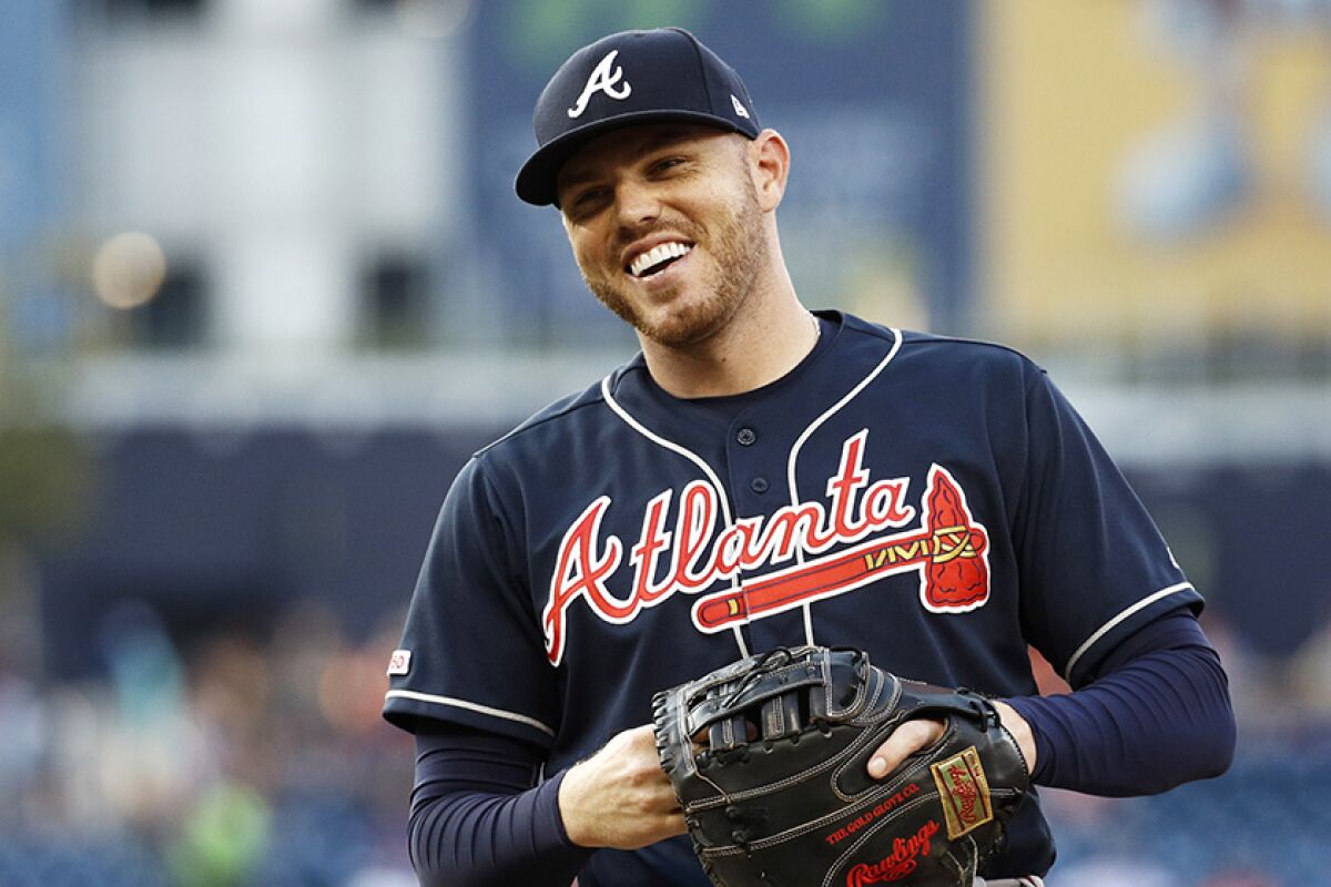 Freddie Freeman smiles during a game between the Atlanta Braves and Washington Nationals in 2019.