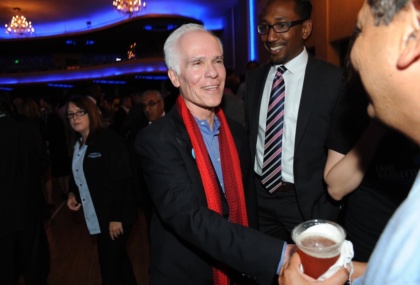 Former L.A. County Dist. Atty. Gil Garcetti greets supporters of his son, L.A. mayoral candidate Eric Garcetti, at an election night party at the Hollywood Palladium.