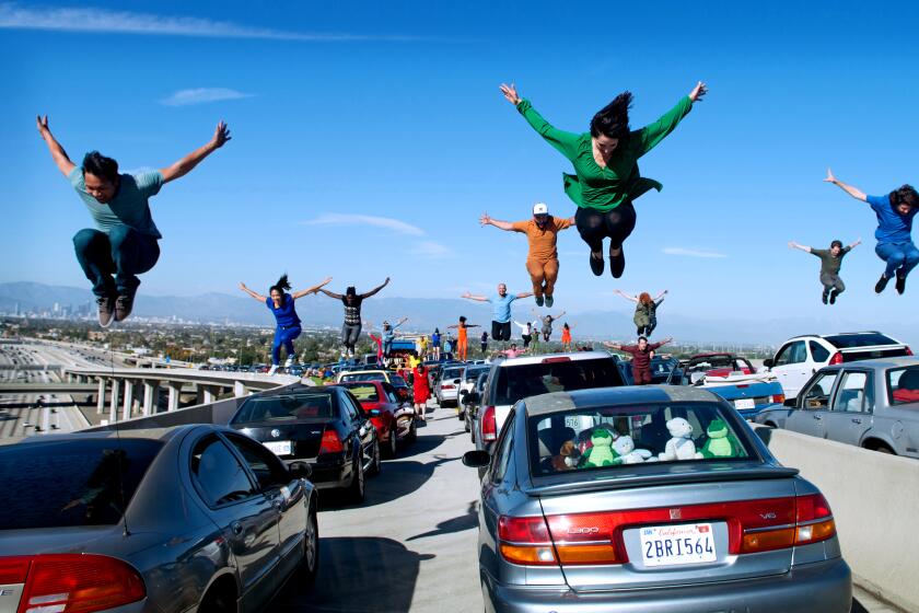 Traffic congestion in Los Angeles gets a high-flying diversion in Damien Chazelle's magical movie musical, "La La Land."