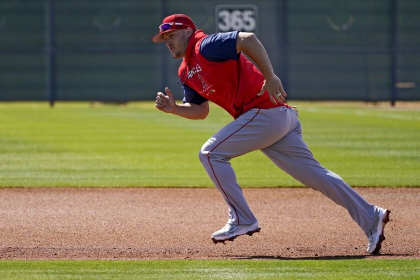 The Angels' Mike Trout runs the bases during spring training workouts March 14, 2022, in Tempe, Ariz.