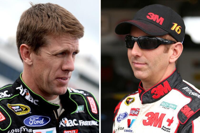 Roush Fenway Racing drivers Carl Edwards, left, and Greg Biffle will try to keep alive their Sprint Cup championship hopes this weekend in Dover, Del.