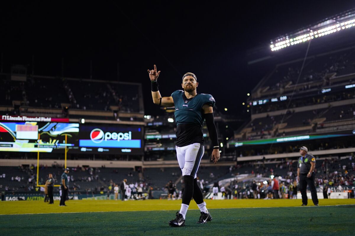 Philadelphia Eagles tight end Zach Ertz gestures as he leaves the field after an NFL football game against the Tampa Bay Buccaneers on aThursday, Oct. 14, 2021, in Philadelphia. (AP Photo/Matt Slocum)