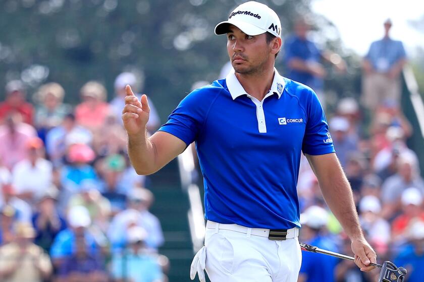 Jason Day reacts after sinking a putt at No. 17 during the second round of the Arnold Palmer Invitational on Friday.