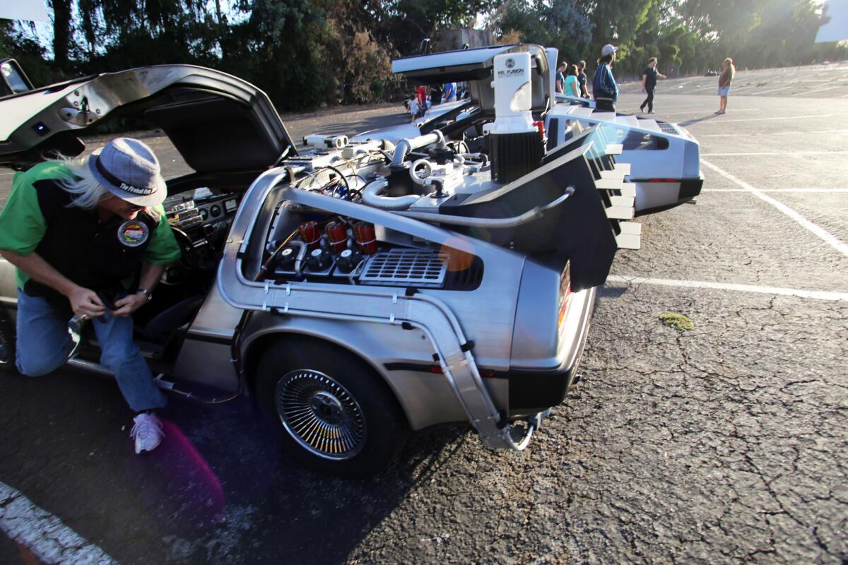 "Doc" parks his "Time Machine" DeLorean at a "Drive-In to the Future" double feature.