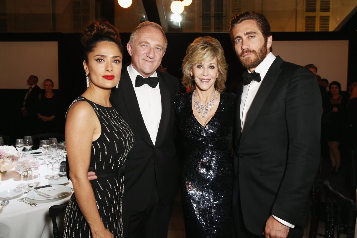 Salma Hayek, left, with her husband, Kering Chief Executive Francois-Henry Pinault, and actors Jane Fonda and Jake Gyllenhaal at the Kering Official Cannes Dinner on May 17.