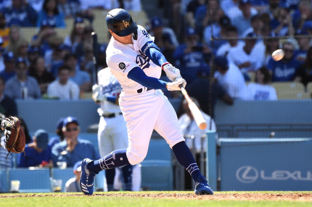 Dodgers Kiki Hernandez hits his second home run of the game against the Diamondbacks in the 7th inning at Dodger Stadium.