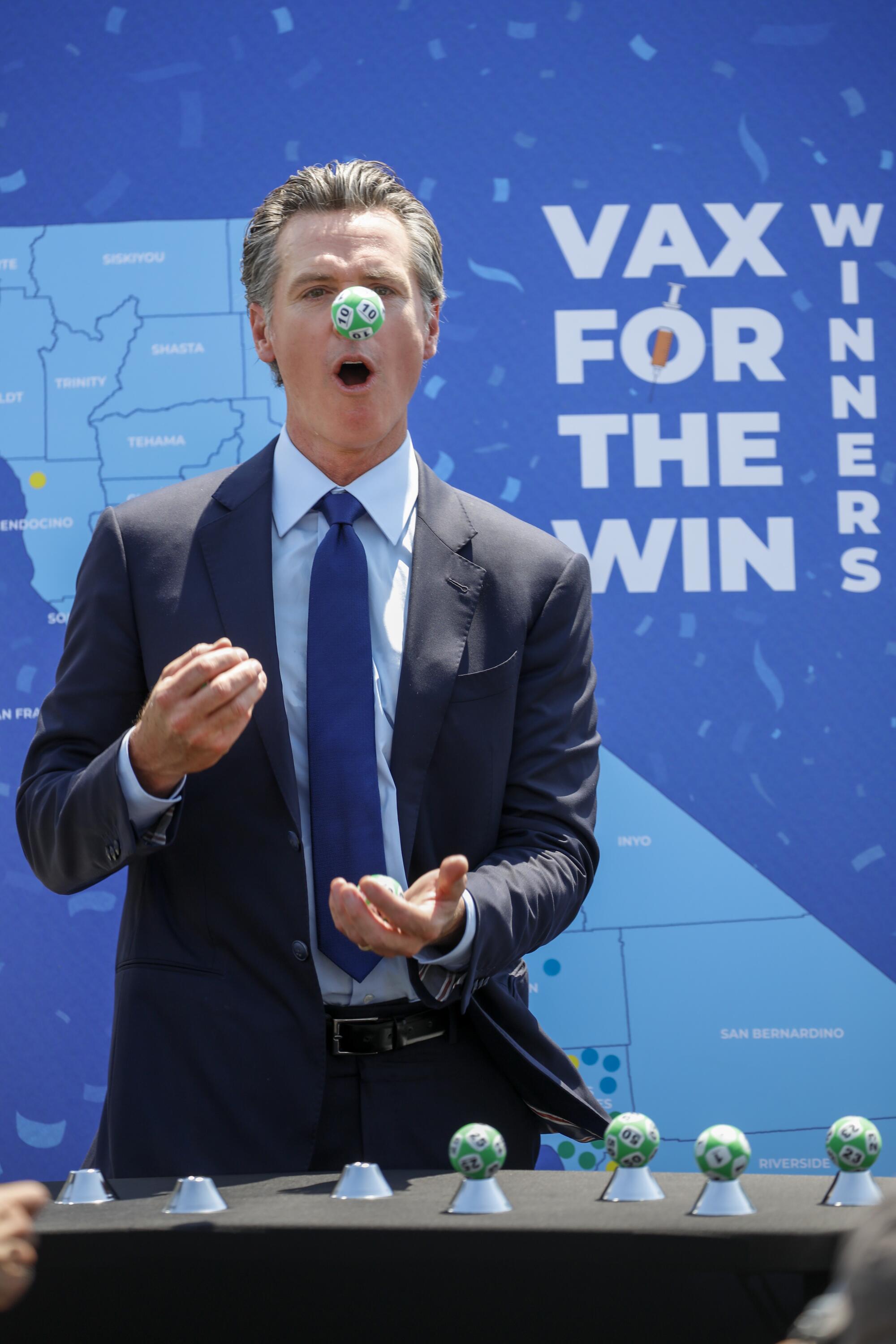 Gov. Gavin Newsom juggles numbered balls