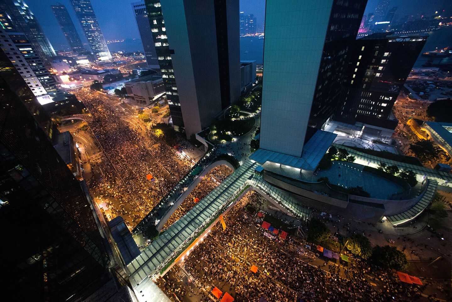 Thousands of pro democracy supporters continue to occupy the streets surrounding Hong Kong's financial district on Sept. 30.