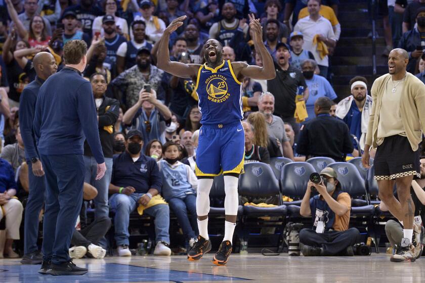 Golden State Warriors forward Draymond Green (23) reacts after being ejected in the first half during Game 1 of a second-round NBA basketball playoff series against the Memphis Grizzlies, Sunday, May 1, 2022, in Memphis, Tenn. (AP Photo/Brandon Dill)