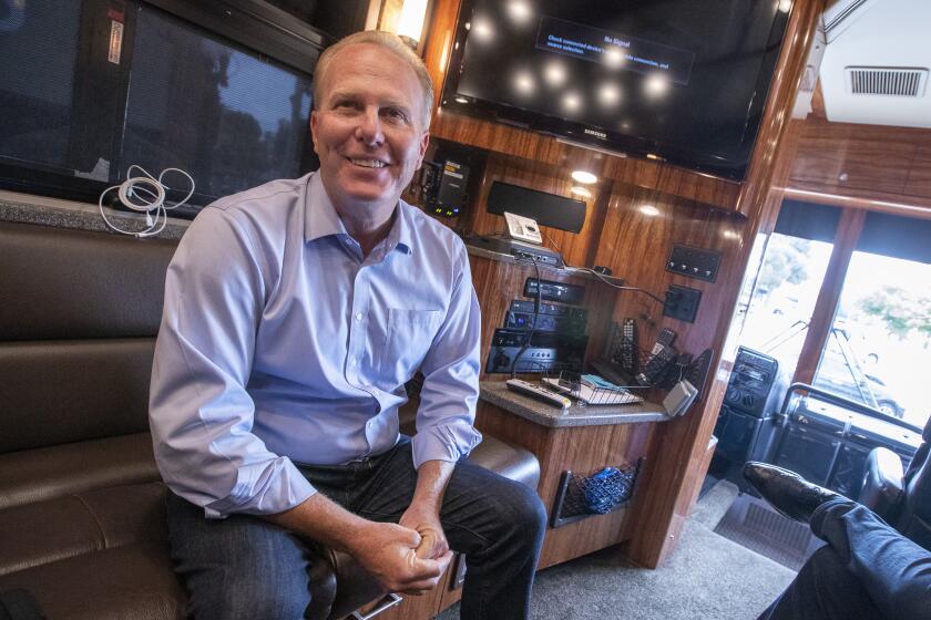 WHITTIER, CA - August 21,2021: Former San Diego Mayor Kevin Faulconer chats during an interview during a campaign stop on his California Comeback Bus Tour in Whittier on Saturday, Aug. 21, 2021 in WHITTIER, CA. (Brian van der Brug / Los Angeles Times)