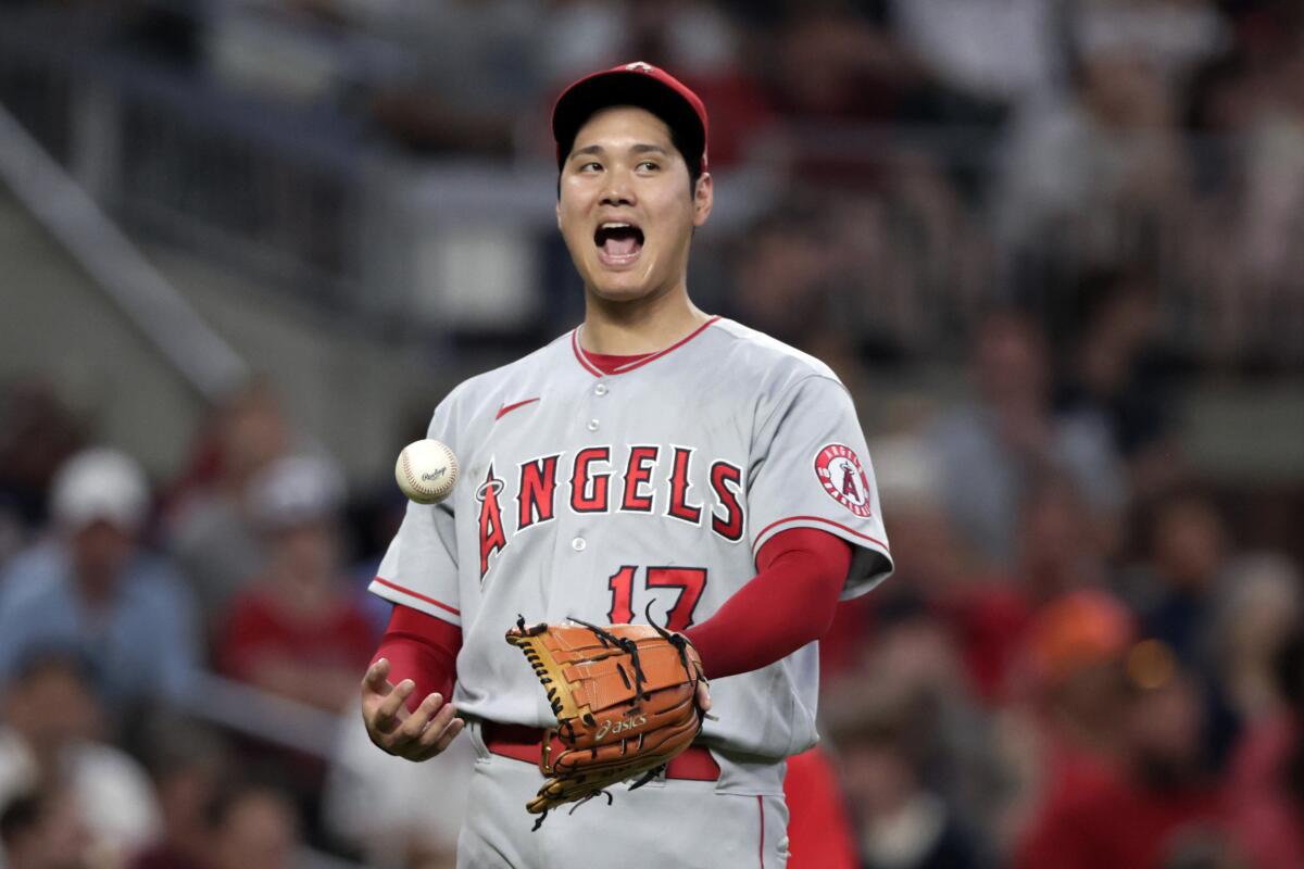 Angels starter Shohei Ohtani reacts after giving up a seventh-inning homer on July 22, 2022.