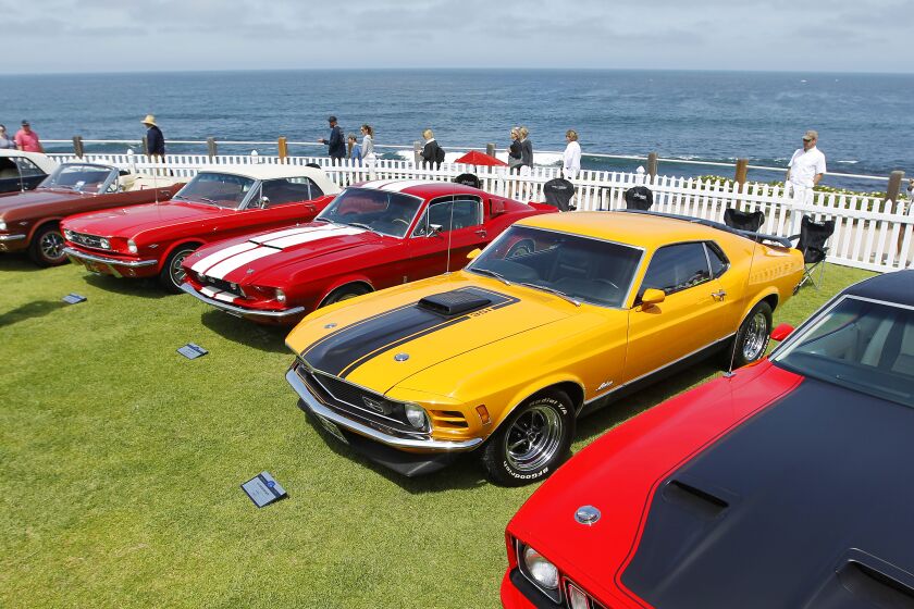 Ford Mustangs are lined up at the La Jolla Concours d"Elegance classic car show in La Jolla on April 14, 2019.