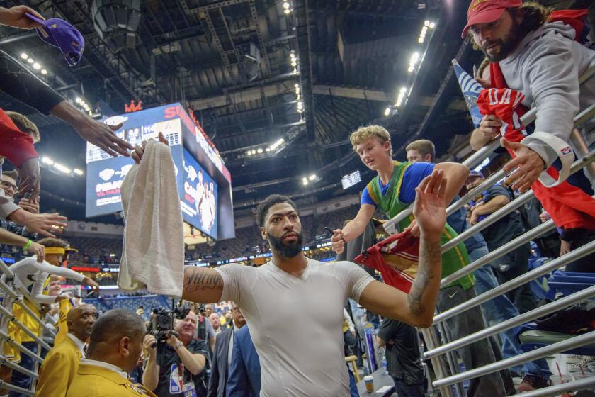 Los Angeles Lakers forward Anthony Davis (3) leaves after the Lakers' 114-110 victory over the New Orleans Pelicans in his first game back at the Smoothie King Center since leaving for the Lakers, Wednesday, Nov. 27, 2019, in New Orleans . (AP Photo/Matthew Hinton)
