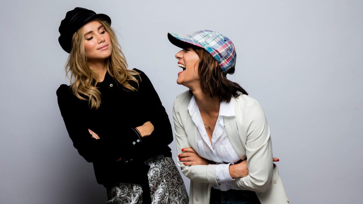 Actress Suki Waterhouse, left, and director Ana Lily Amirpour, from the film 'The Bad Batch,' photographed in the L.A. Times photo studio at the 41st Toronto International Film Festival