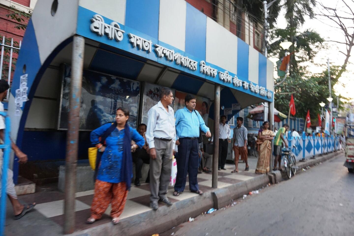 Blue and white bus stop in Kolkata