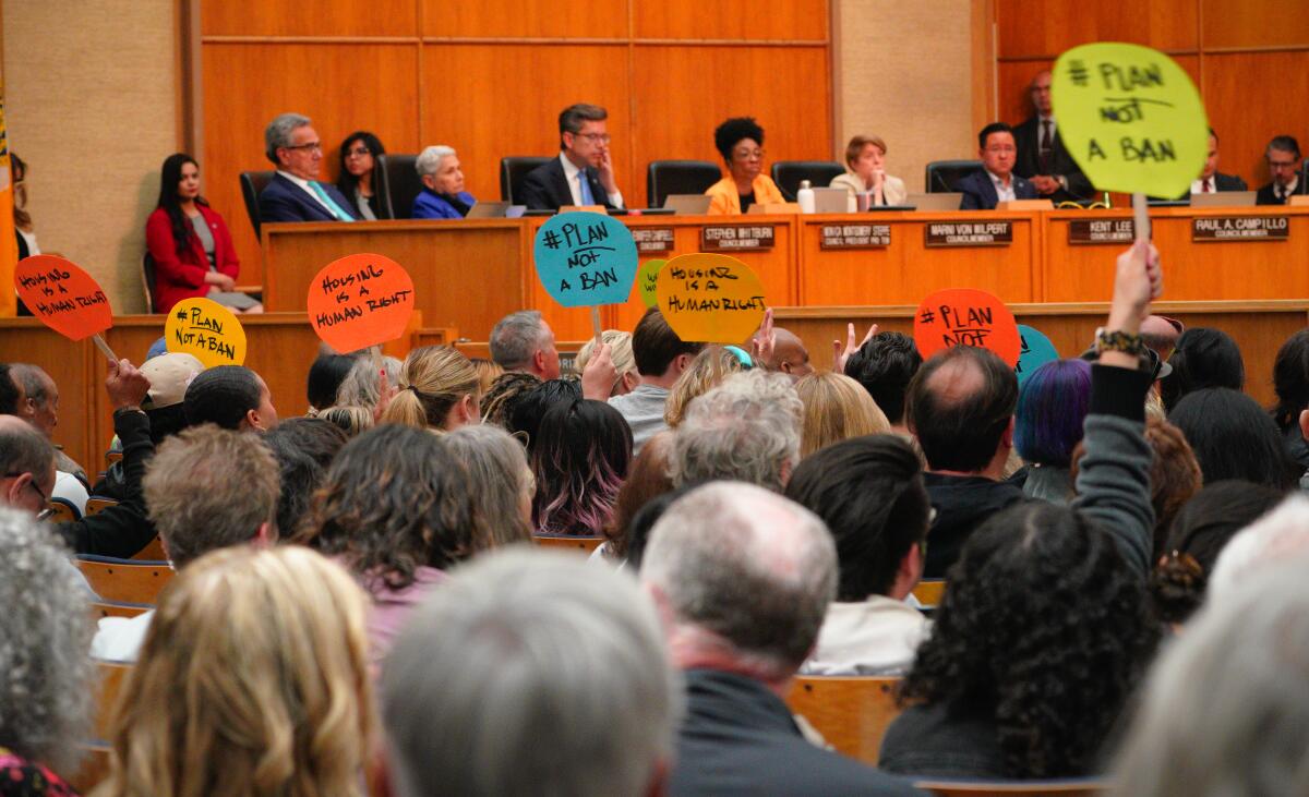 The San Diego City Council discusses a proposed homeless encampment ban while critics of the ordinance show their opposition.