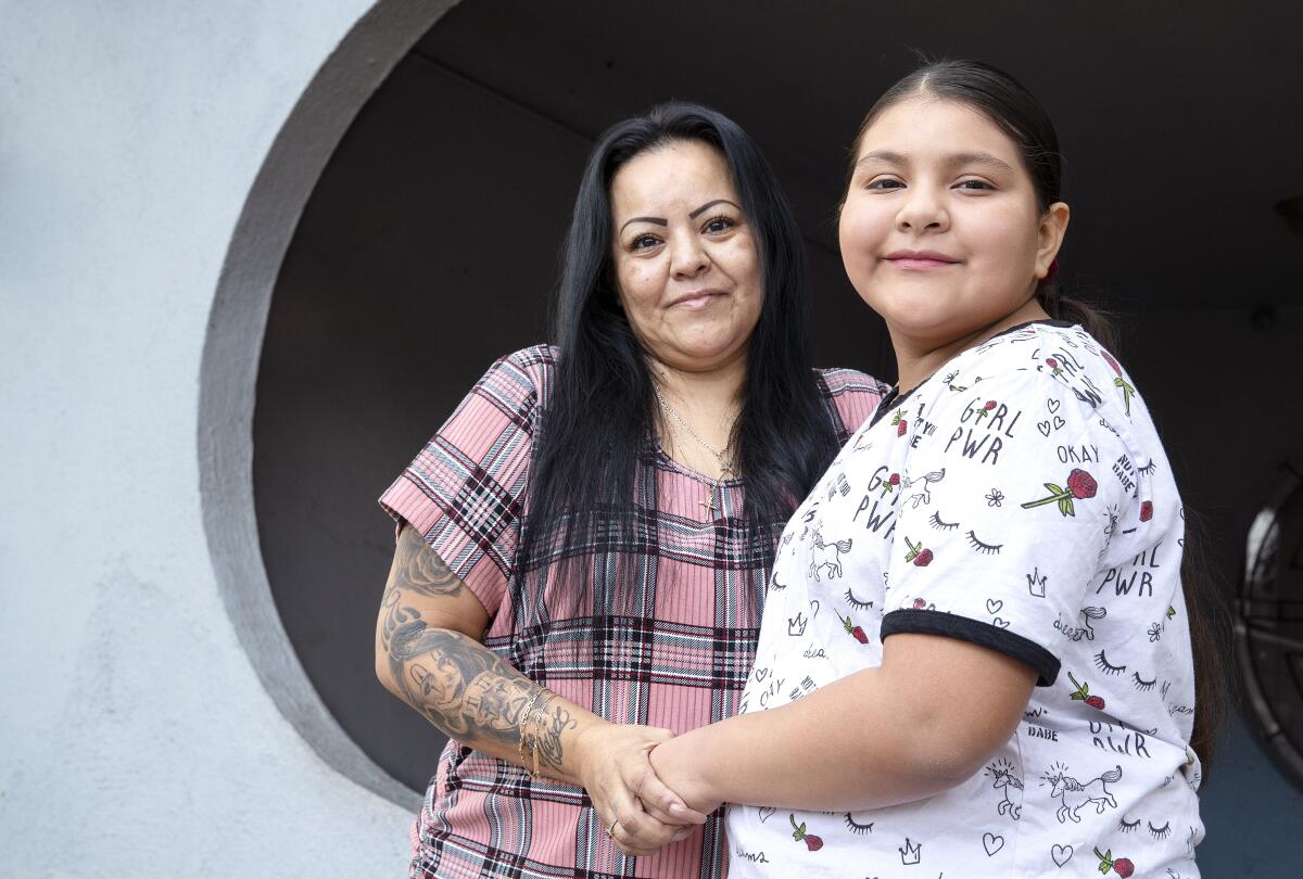 Rena Tafoya with her daughter, Maya Flores