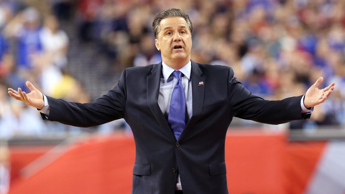 Kentucky Coach John Calipari gestures during the Wildcats' loss to Wisconsin in the NCAA Final Four on April 4, 2015.