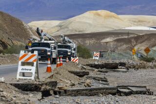 Death Valley, CA, Thursday, August 31, 2023 - ATT crews traverse along hwy 190 where most of the road was washed out by Tropical Storm Hilary last week. (Robert Gauthier/Los Angeles Times)