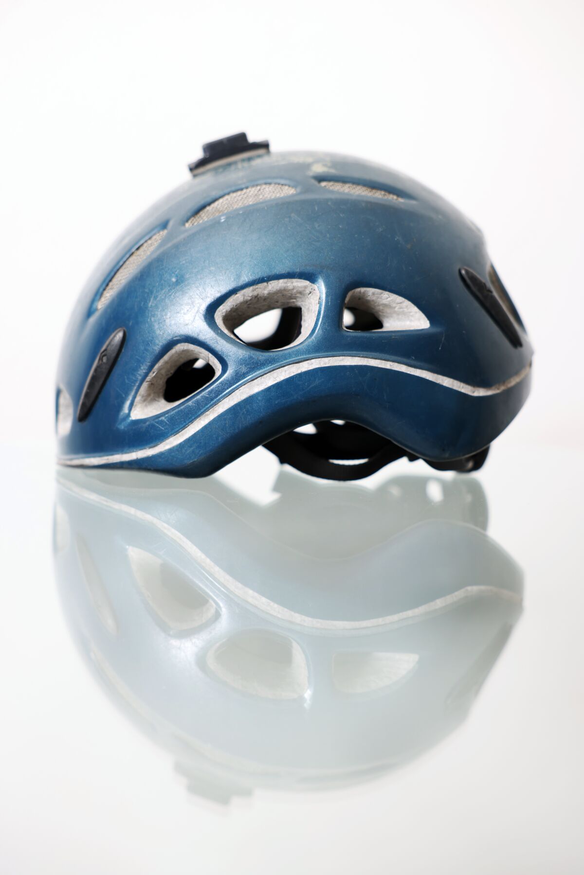 A blue helmet with airflow vents.