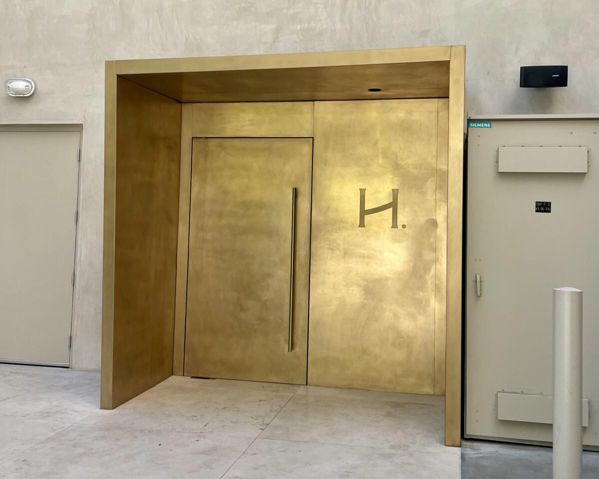 The gilded doors at the entrance of Heimat