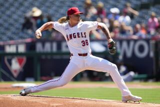 Los Angeles Angels starting pitcher Caden Dana (36) throws during the first inning.