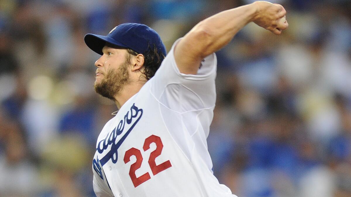 Dodgers starter Clayton Kershaw delivers a pitch during the team's 4-1 victory over the Washington Nationals on Tuesday. Kershaw earned his 17th victory of the season.
