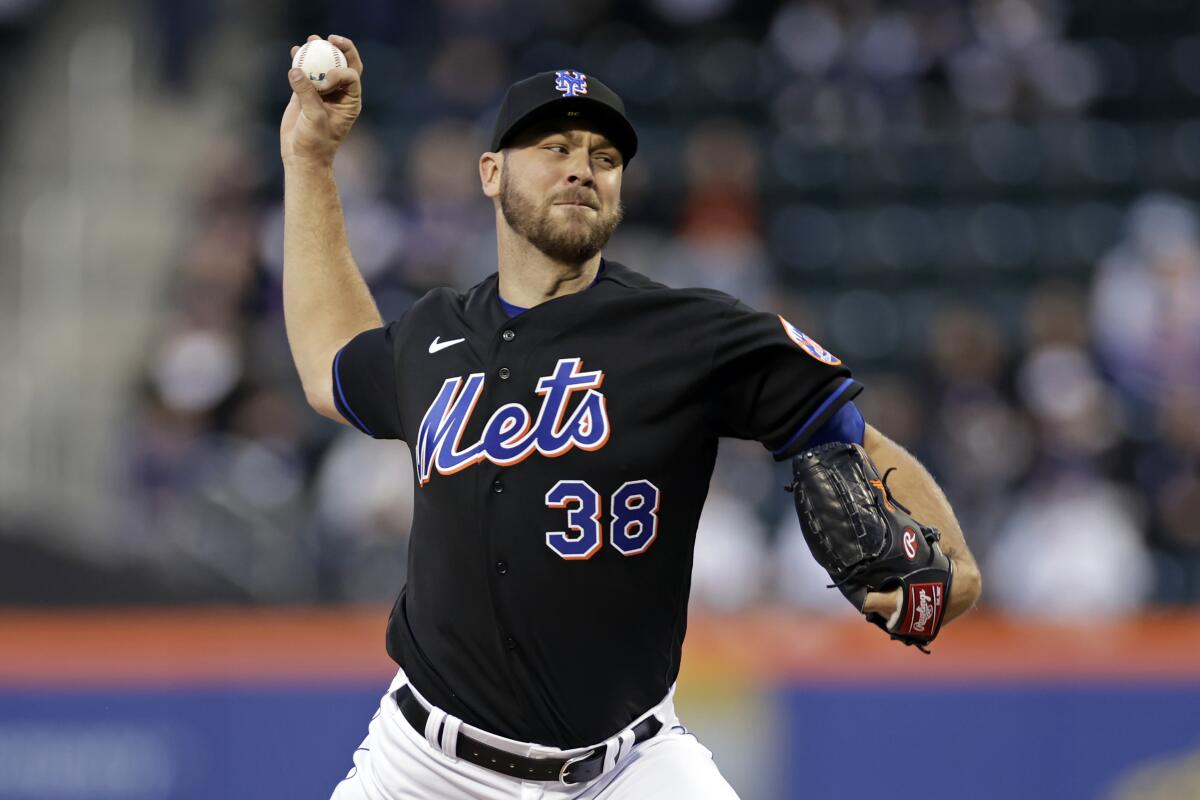 New York Mets pitcher Tylor Megill throws during the first inning.