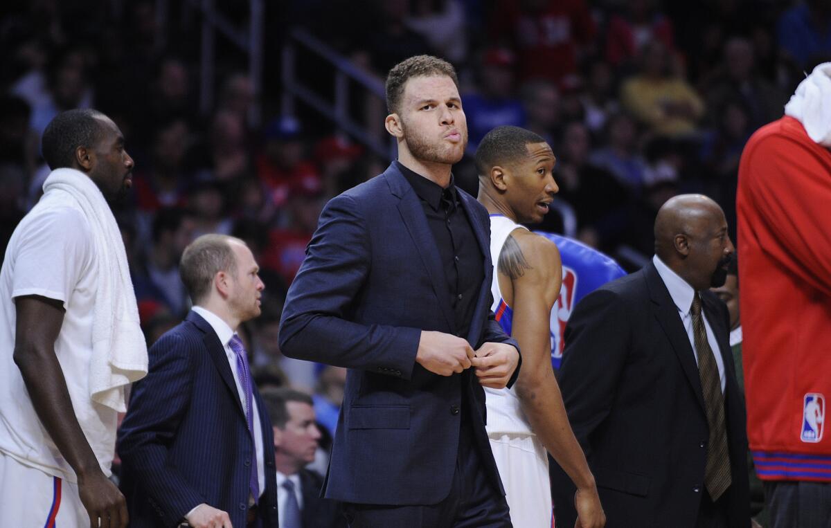 Injured Clippers forward Blake Griffin during a timeout of a game against the Cavaliers.