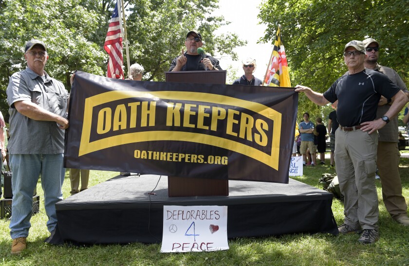 FILE - Stewart Rhodes, founder of the citizen militia group known as the Oath Keepers, center, speaks during a rally outside the White House in Washington, on June 25, 2017. The seditious conspiracy case filed this week against members and associates of the far-right Oath Keepers militia group marked the boldest attempt so far by the government to prosecute those who attacked the U.S. Capitol during the Jan. 6 riot. (AP Photo/Susan Walsh, File)