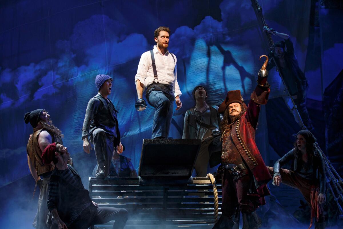 The Broadway musical "Finding Neverland" -- with Matthew Morrison, center, and Kelsey Grammer, right -- is among the Peter Pan projects pinging prominently on the cultural radar.