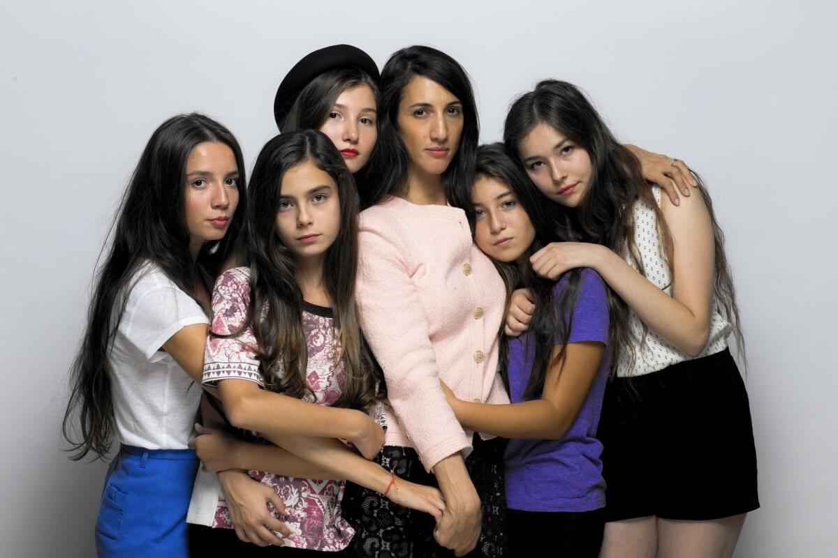 Director and writer Deniz Gamze Ergüven, center, and the cast of “Mustang,” France’s submission to the foreign-language film Oscar competition: Elit Iscan, left, Günes Sensoy, Ilayda Akdogan, Doga Zeynep Doguslu and Tugba Sunguroglu.
