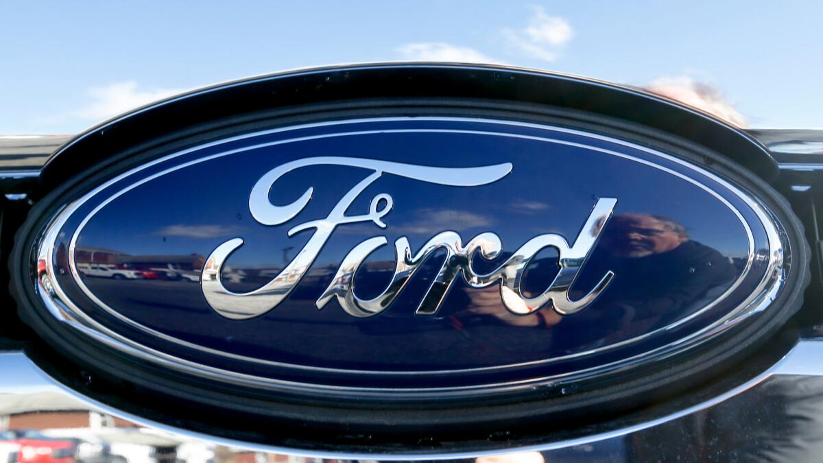 Ford says it will begin selling fully autonomous cars, with no steering wheels or pedals, by 2021, focused at first on ridehailing and ridesharing applications. (Keith Srakocic / Associated Press)