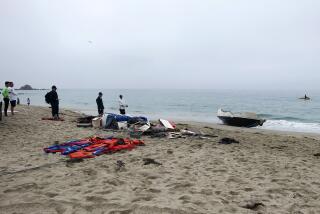 Photo taken morning of Sept. 2, 2024, shows suspected migrant boat abandoned at Victoria Beach in Laguna Beach.