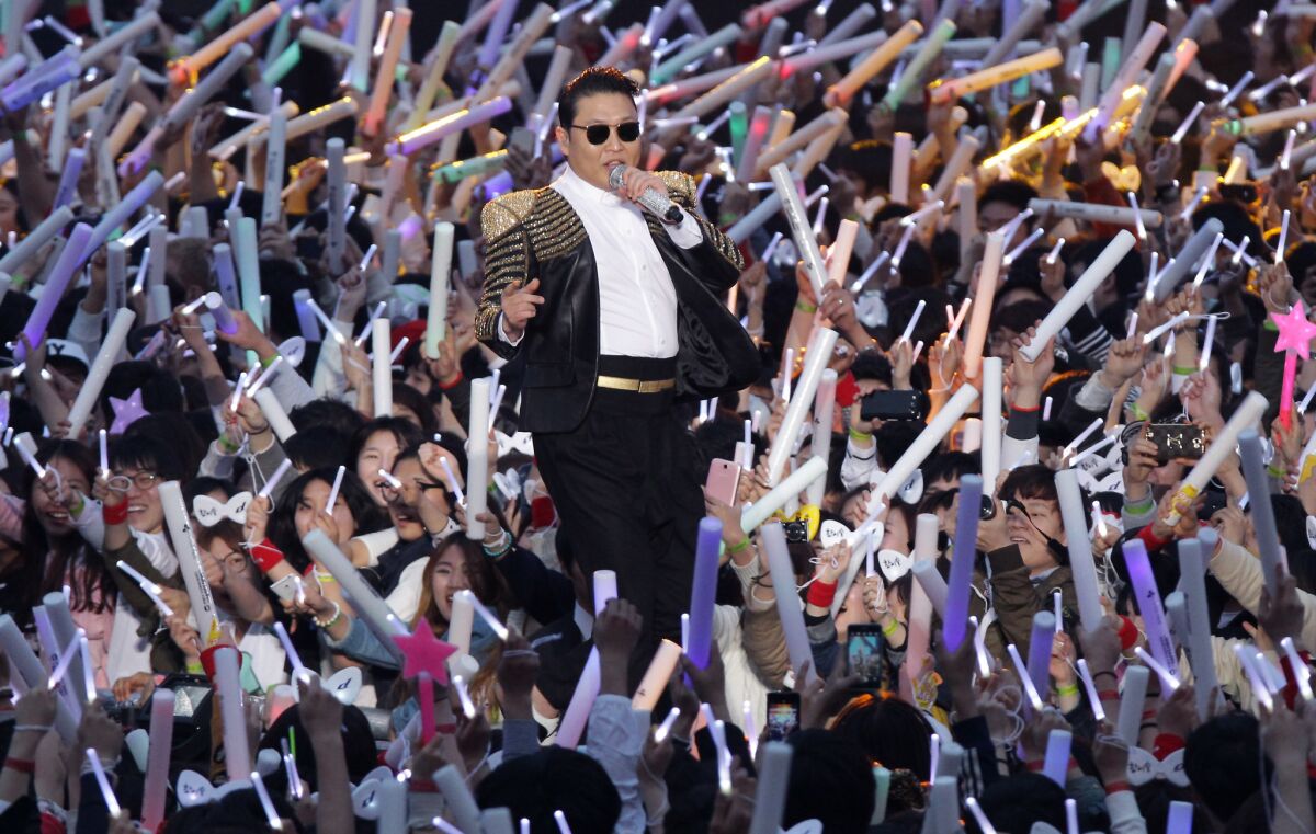 Psy performs at Olympic Stadium in Seoul on Saturday.