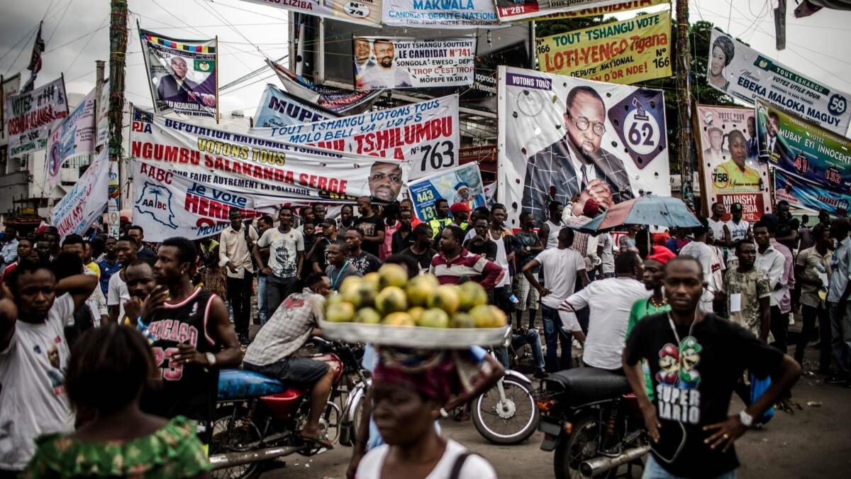 Electoral banners are displayed in the Ndjili district of Kinshasa, Congo, on Wednesday.