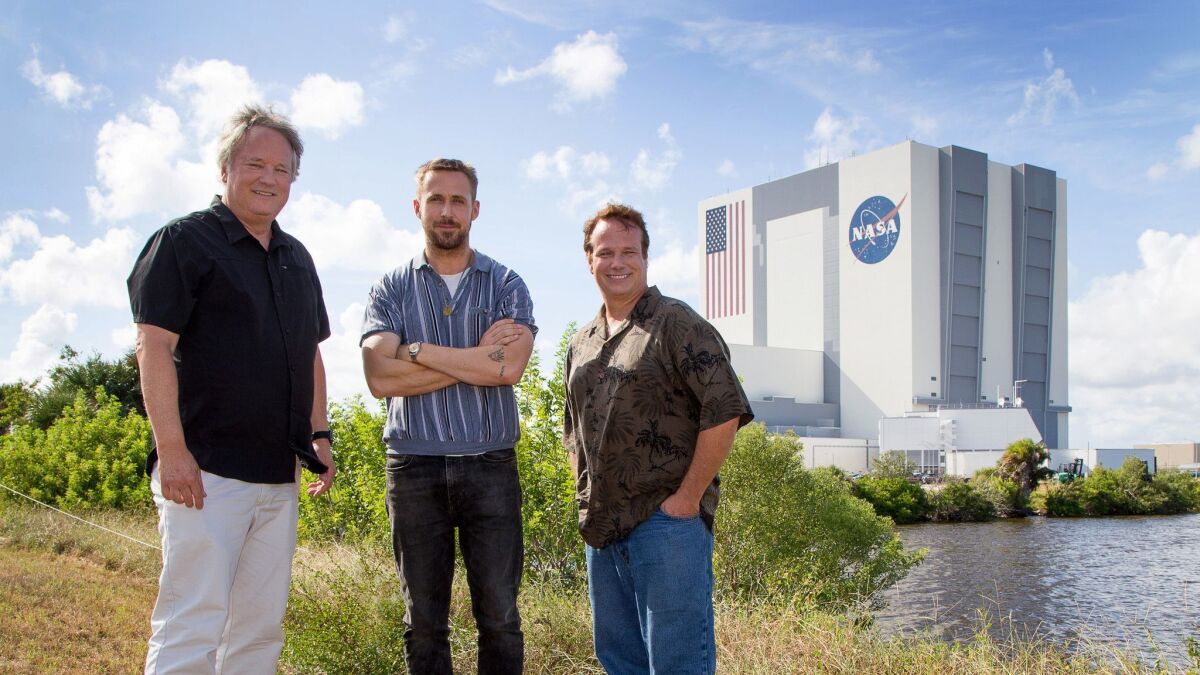 Rick Armstrong, left, Gosling and Mark Armstrong at the Kennedy Space Center.