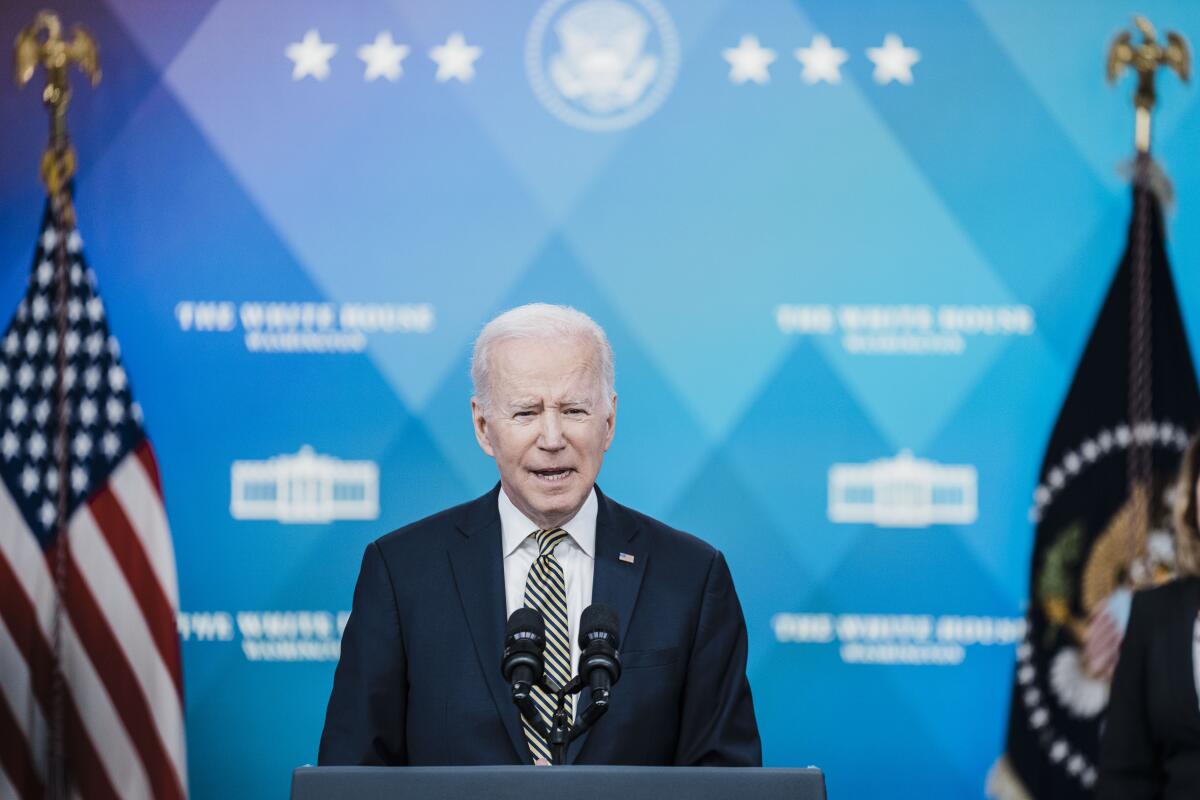 President Biden speaks at a news conference.