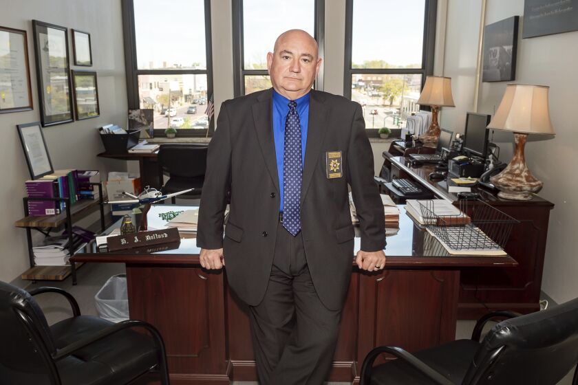 Union Parish special prosecutor Hugo Holland stands for a portrait in his office in Minden, La., on Friday, March 17, 2023. In the case of five white officers charged in the deadly 2019 arrest of Black motorist Ronald Greene, the Black district attorney in mostly white Union Parish has decided to bring in a hired gun: Holland, an experienced special prosecutor with a folksy law-and-order bravado and a three-decades-long reputation for winning complicated cases across the state. (AP Photo/Scott Clause)