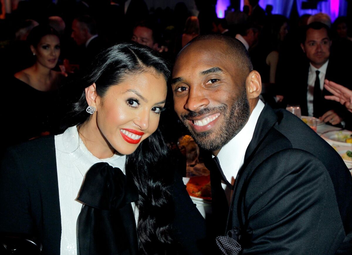 Vanessa and Kobe Bryant smile while attending a charity event in Beverly Hills in May.