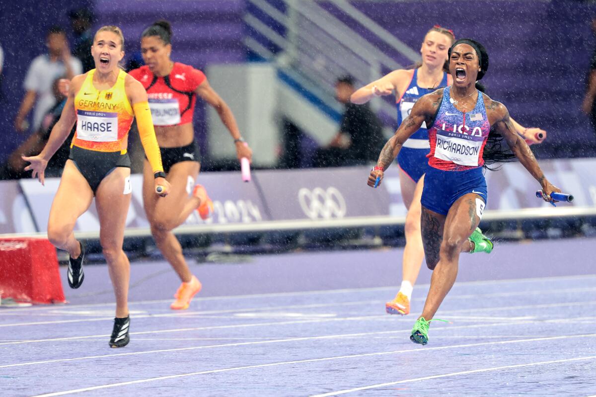 Sha'carri Richardson celebrates after clinching a gold medal in the 4X100-meter relay at the 2024 Paris Olympics Friday.