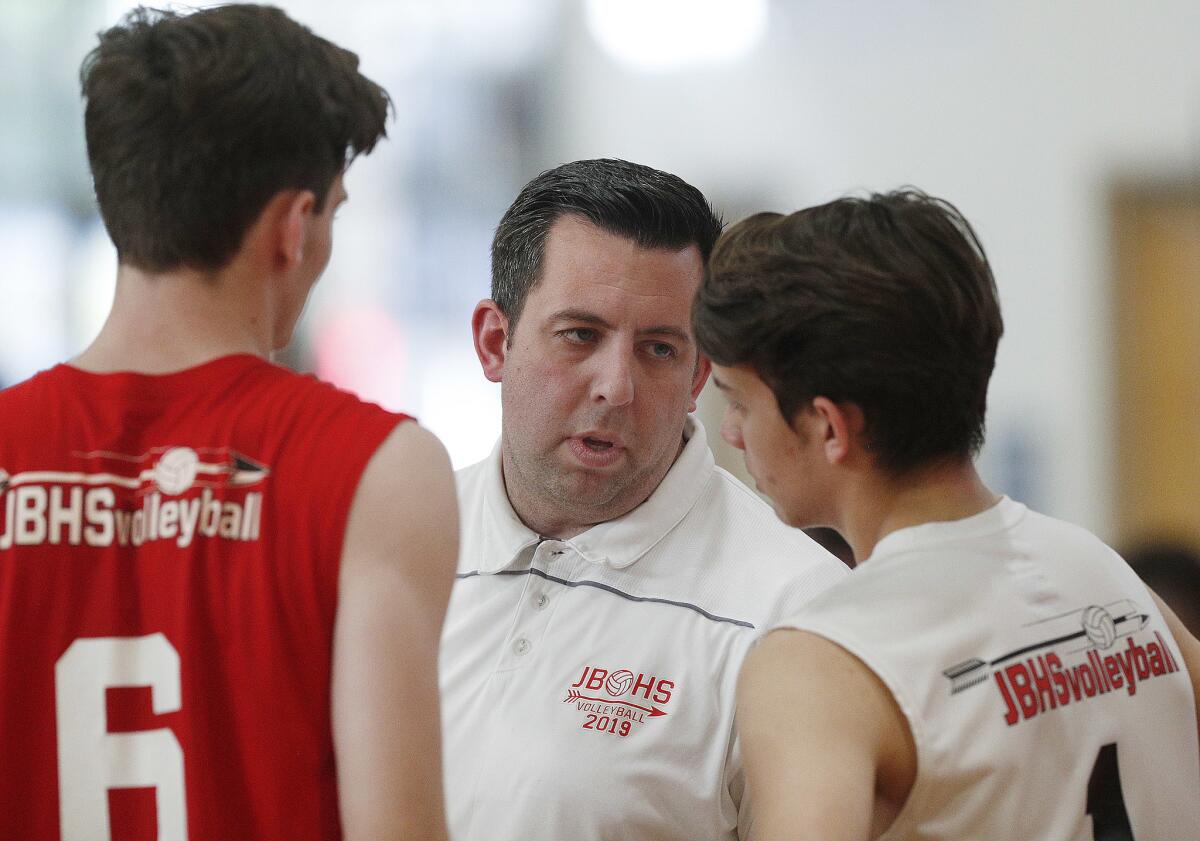 Burroughs High boys' volleyball coach Joel Brinton, seen here in a file photo, said his phone blew up with messages after athletic activities were suspended because of the coronavirus outbreak.